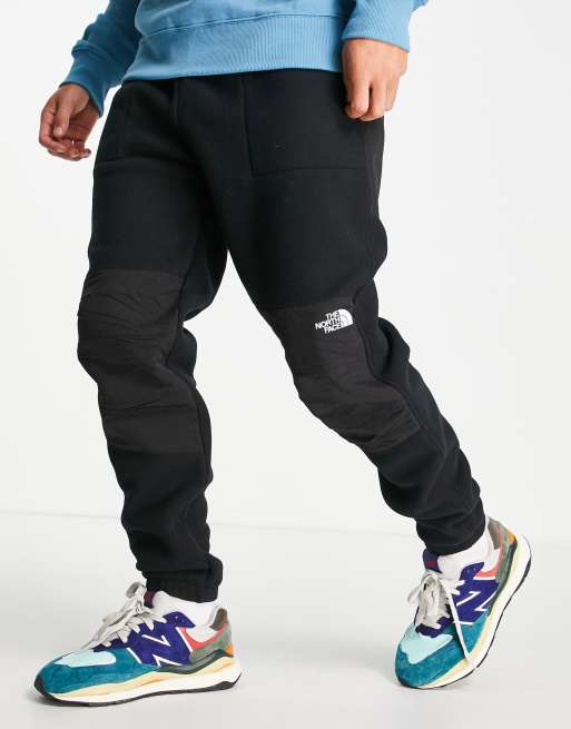 The North Face Tight sweatpants in black Exclusive at ASOS