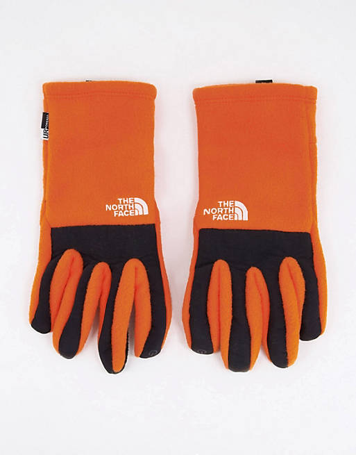Men Gloves/The North Face Denali Etip gloves in orange 