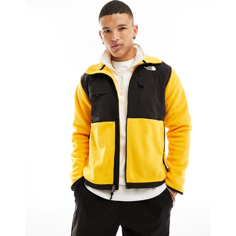 Yellow fuzzy north face on sale jacket