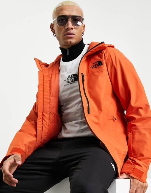 North face windbreaker store orange