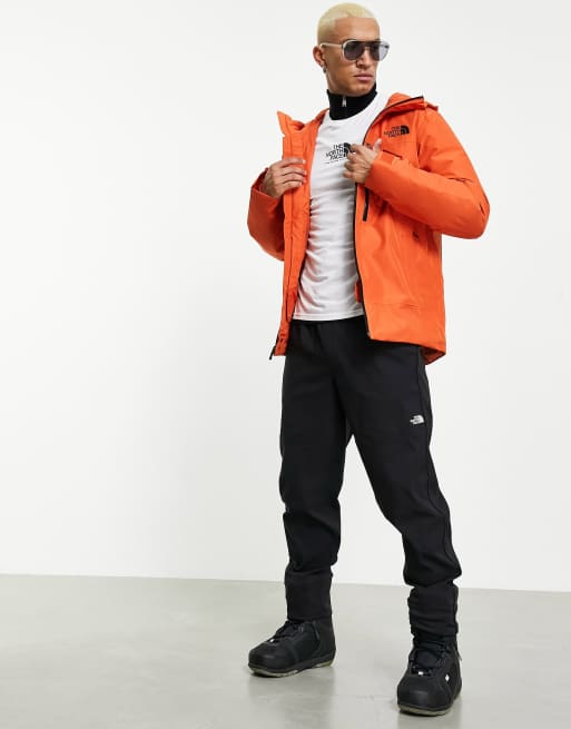 North face shop orange ski jacket