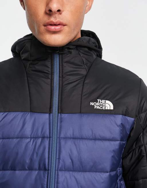 Doudoune north face bleu best sale et noir