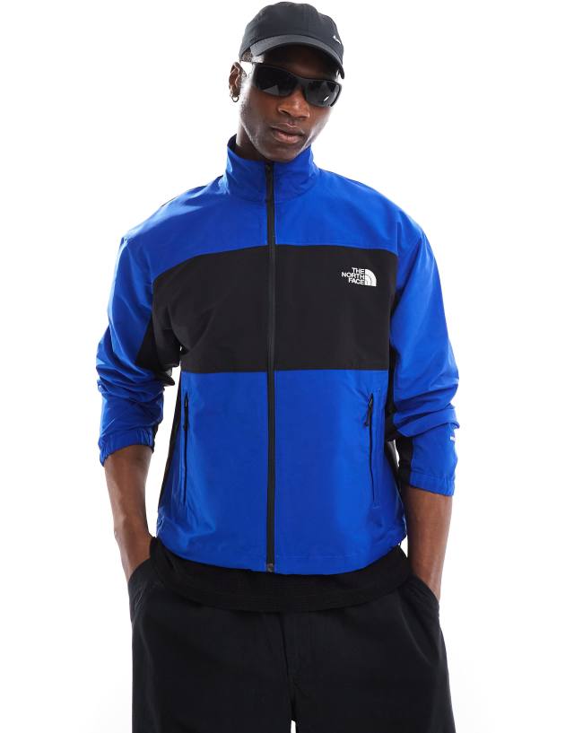 The North Face - easy wind zip colourblock jacket in blue