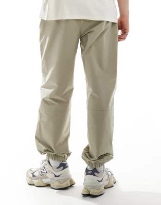 The North Face Easy woven wind pants in clay gray | ASOS