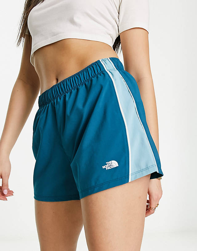 The North Face - elevation side stripe shorts in teal