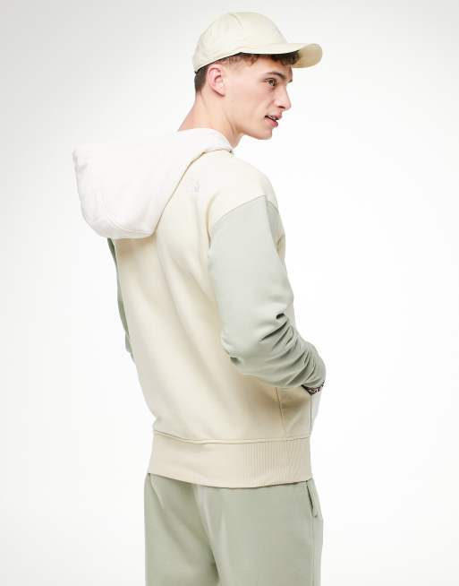 The North Face Essential color block hoodie in green Exclusive to ASOS
