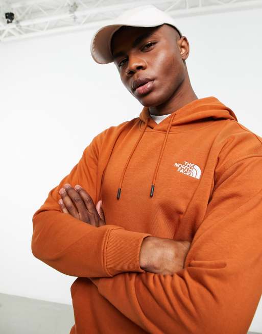 The North Face Essential hoodie in orange Exclusive at ASOS