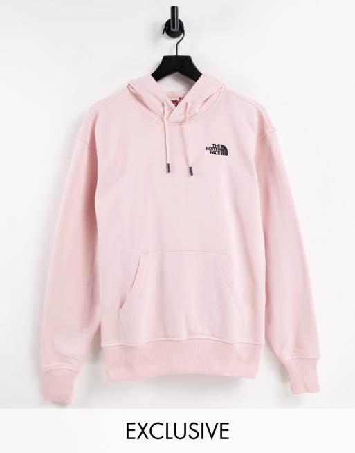 The North Face Essential hoodie in pink Exclusive at ASOS