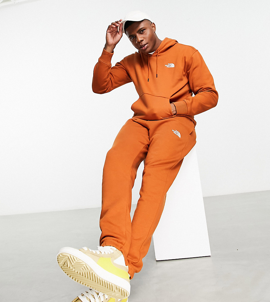 The North Face Essential hoodie in tan - Exclusive to ASOS-Brown