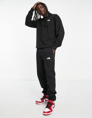 The North Face Essential trackies in black Exclusive at ASOS - ASOS Price Checker