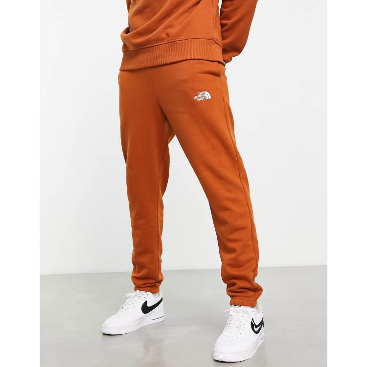 The North Face Essential jogger in brown Exclusive at ASOS ASOS