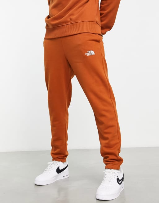 The North Face Essential jogger in brown Exclusive at ASOS | ASOS