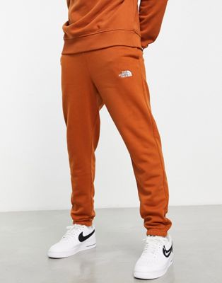 The North Face Essential jogger in brown Exclusive at ASOS