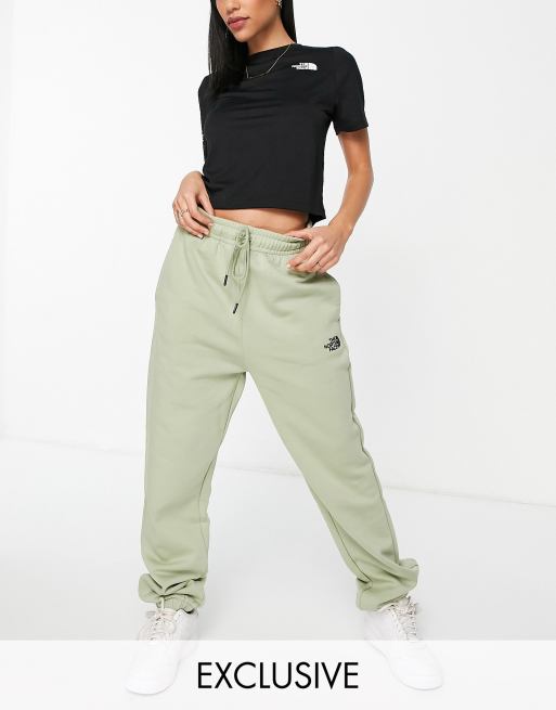 The North Face Essential joggers in green Exclusive at ASOS 
