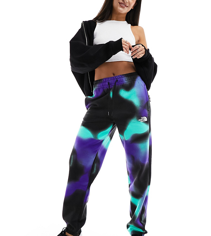 The North Face Essential oversized fleece high waist joggers in blue marble print Exclusive at ASOS