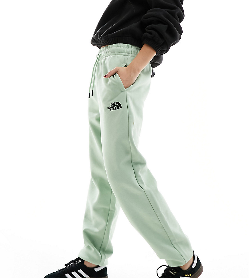 The North Face Essential oversized fleece high waist joggers in sage green Exclusive at ASOS