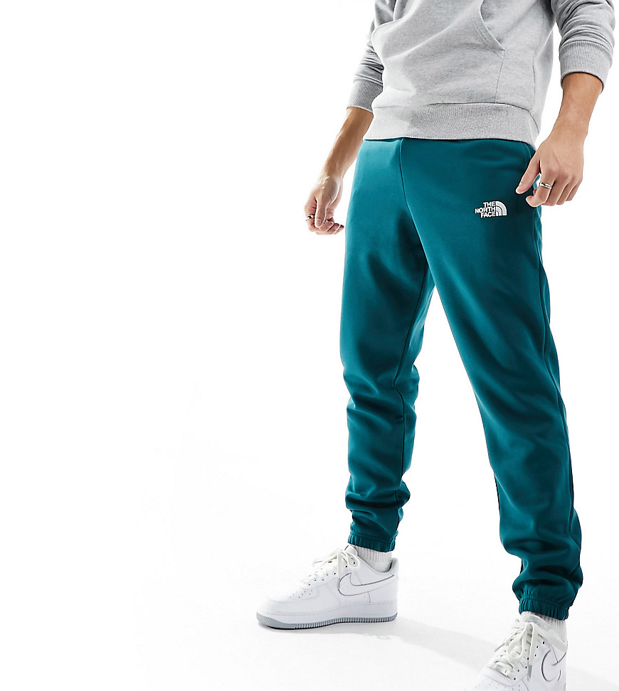 The North Face Essential oversized fleece joggers in green Exclusive at ASOS