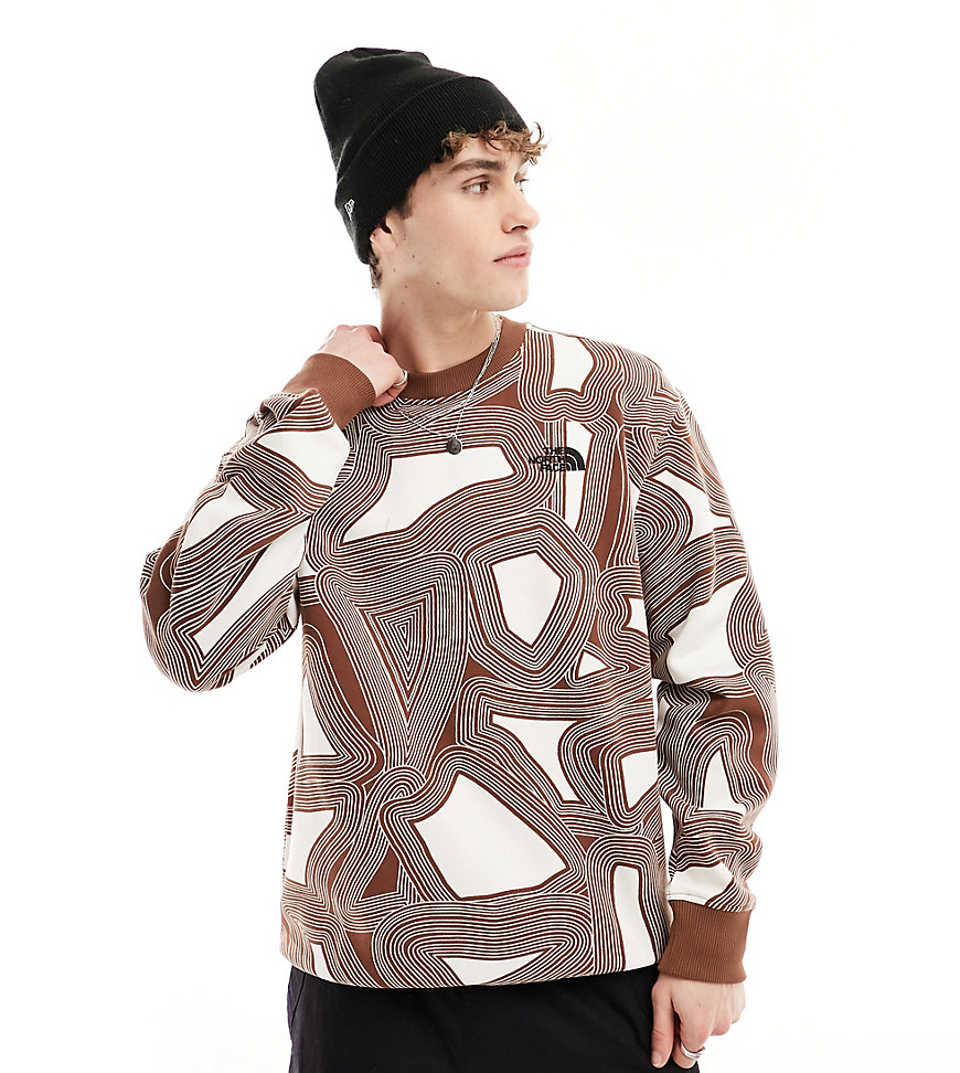 The North Face Essential oversized fleece sweatshirt in brown geo print Exclusive at ASOS