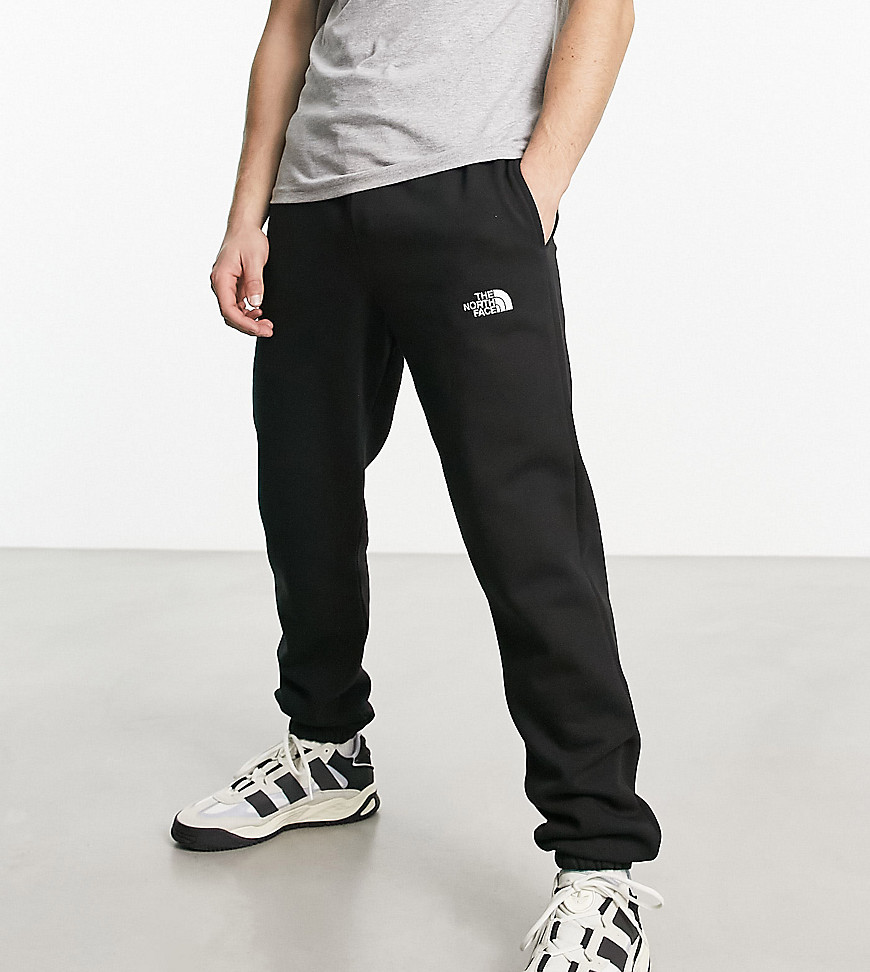 the north face essential oversized joggers in black exclusive at asos
