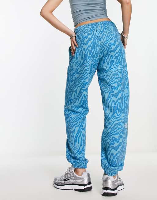 The North Face Essential oversized joggers in blue marble print Exclusive  at ASOS