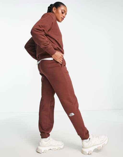 The North Face Essential oversized joggers in brown Exclusive at