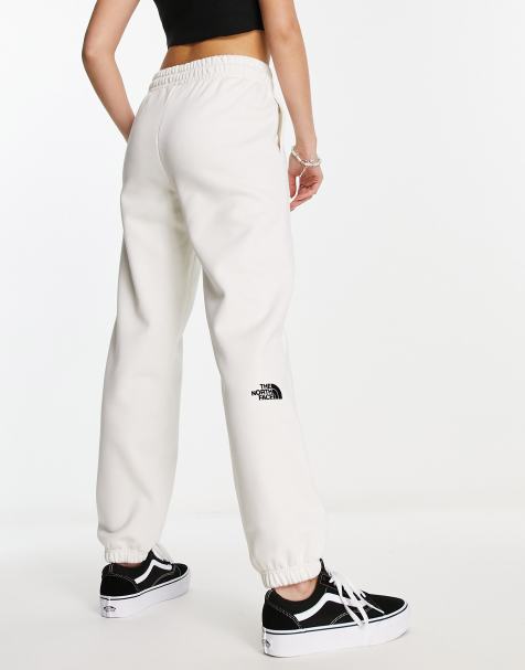 The North Face Tek woven track pants with reflective piping in black