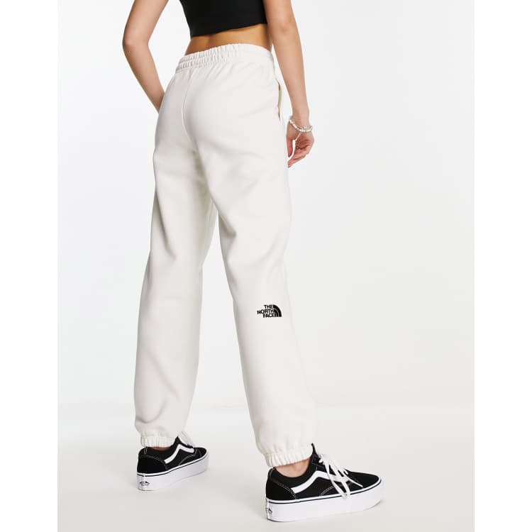The North Face Essential oversized joggers in cream Exclusive at