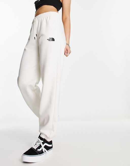 The North Face Essential oversized joggers in cream Exclusive at ASOS