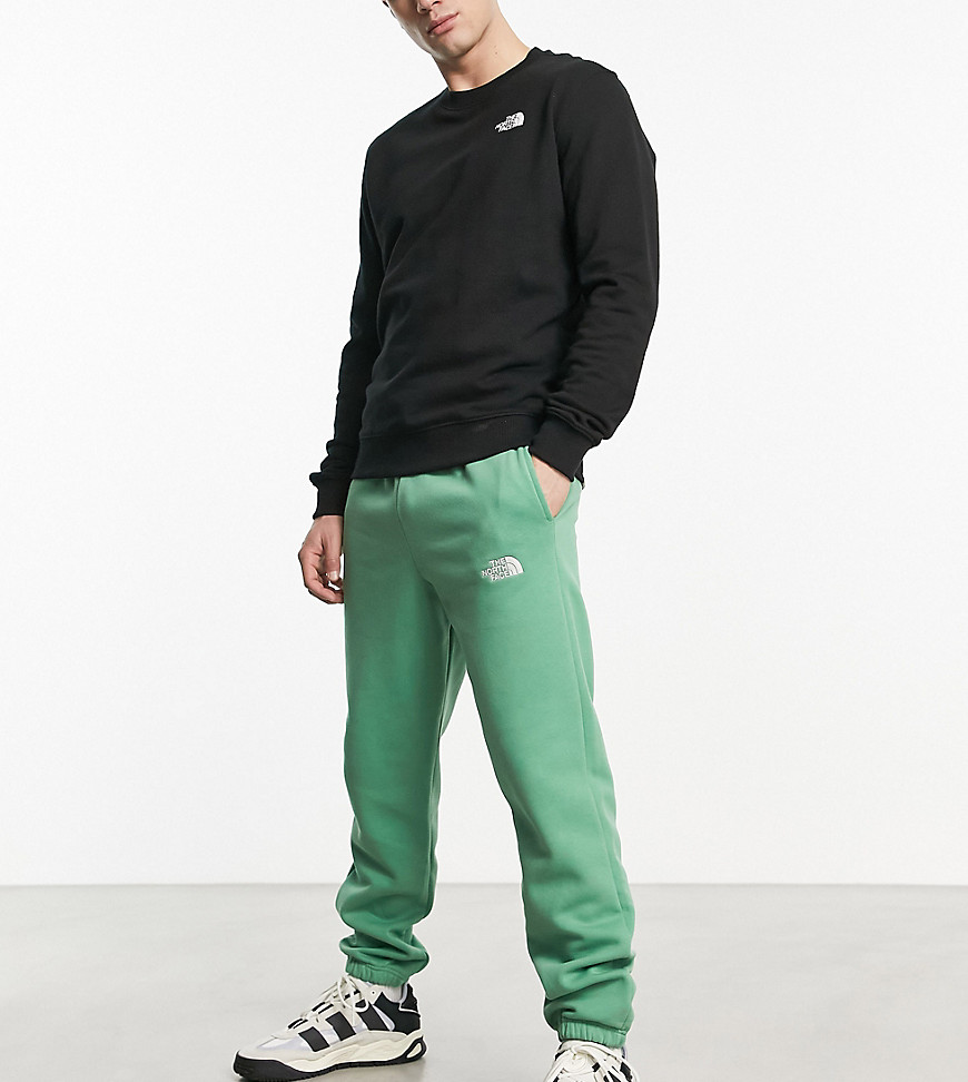The North Face Essential oversized joggers in green Exclusive at ASOS