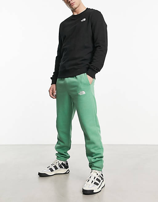 The North Face Essential oversized joggers in green Exclusive at ASOS ...