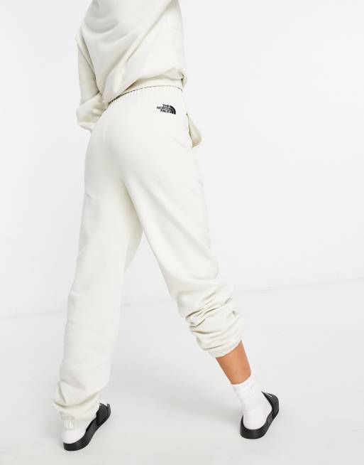 The North Face Essential oversized sweatpants in off white