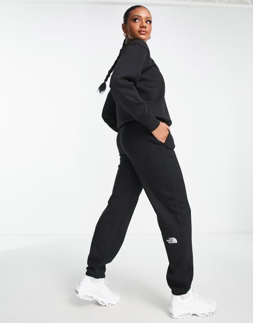 The North Face Essential oversized trackies in black Exclusive at ASOS