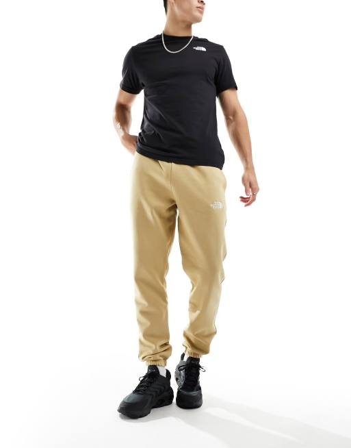 The North Face – Essential – Sandfärgad oversize huvtröja i fleece – Exklusivt hos ASOS