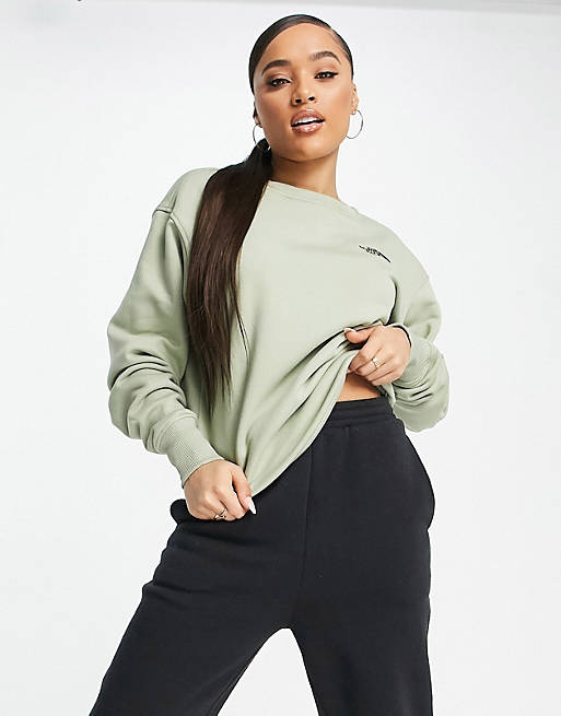 The North Face Essential sweatshirt in green Exclusive at ASOS