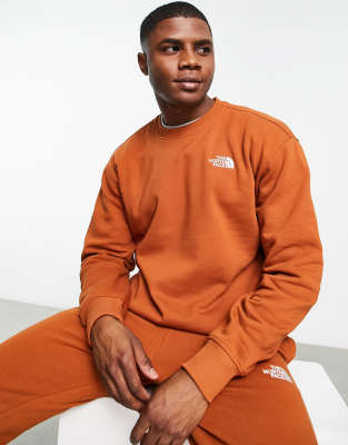 The North Face Essential sweatshirt in orange Exclusive at ASOS | ASOS
