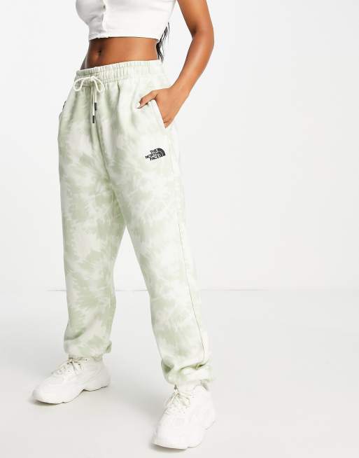 The North Face Essential trackies in white/beige tie dye Exclusive at ASOS 