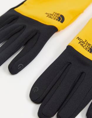 north face yellow gloves