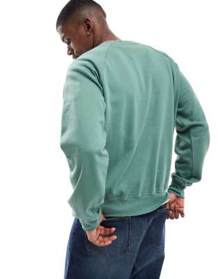The North Face Evolution Crew in green | ASOS