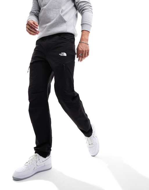 The North Face Exploration regular fit tapered utility pants in black ...