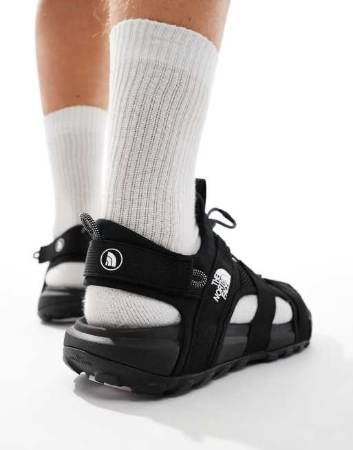 The North Face Explore Camp moc sandals in black ASOS