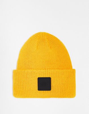 The North Face Explore ribbed beanie in yellow