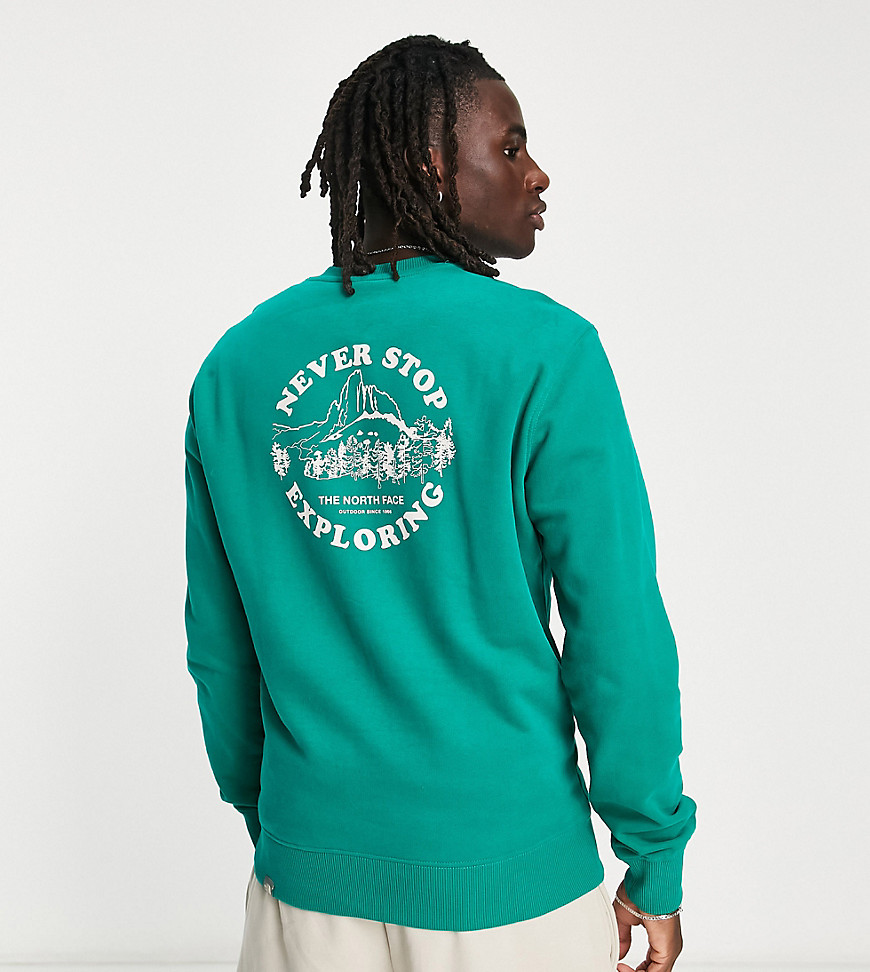 The North Face Exploring Circle back print sweatshirt in green Exclusive at ASOS