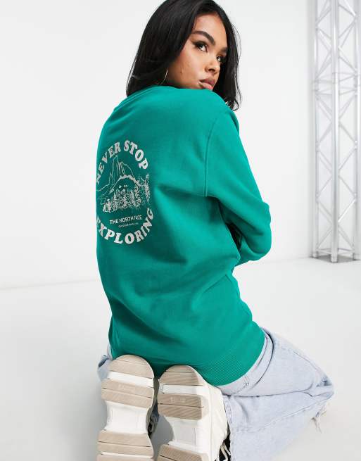 The north shop face green sweatshirt