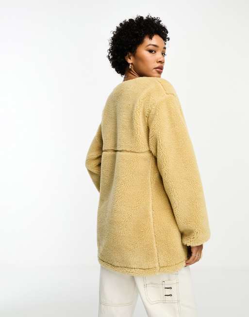 The North Face Extreme teddy fleece coat in beige ASOS