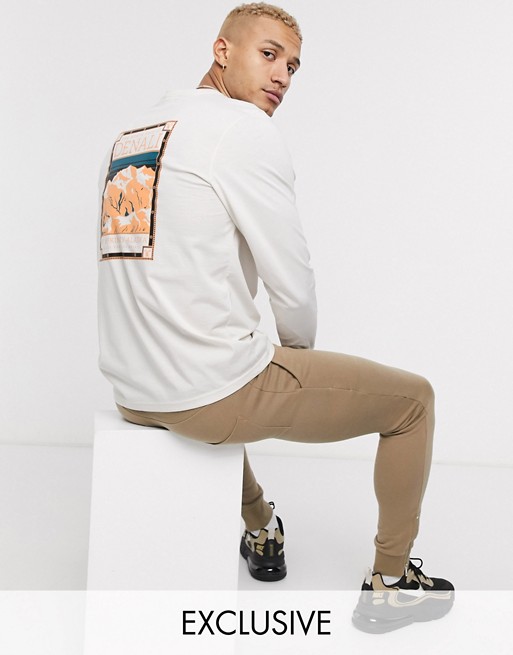 The North Face Faces long sleeve t-shirt in cream Exclusive at ASOS