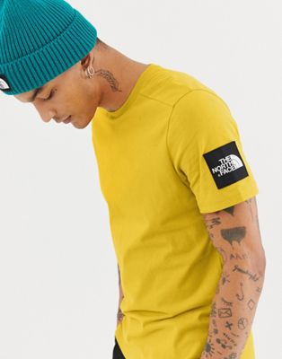 yellow north face top