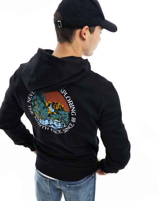 The North Face – Fleece-Kapuzenpullover in Schwarz mit Grafikprint auf dem Rücken