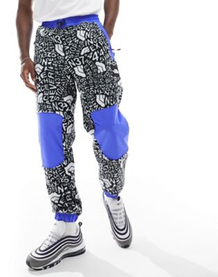 The North Face fleeski y2k joggers in abstract print