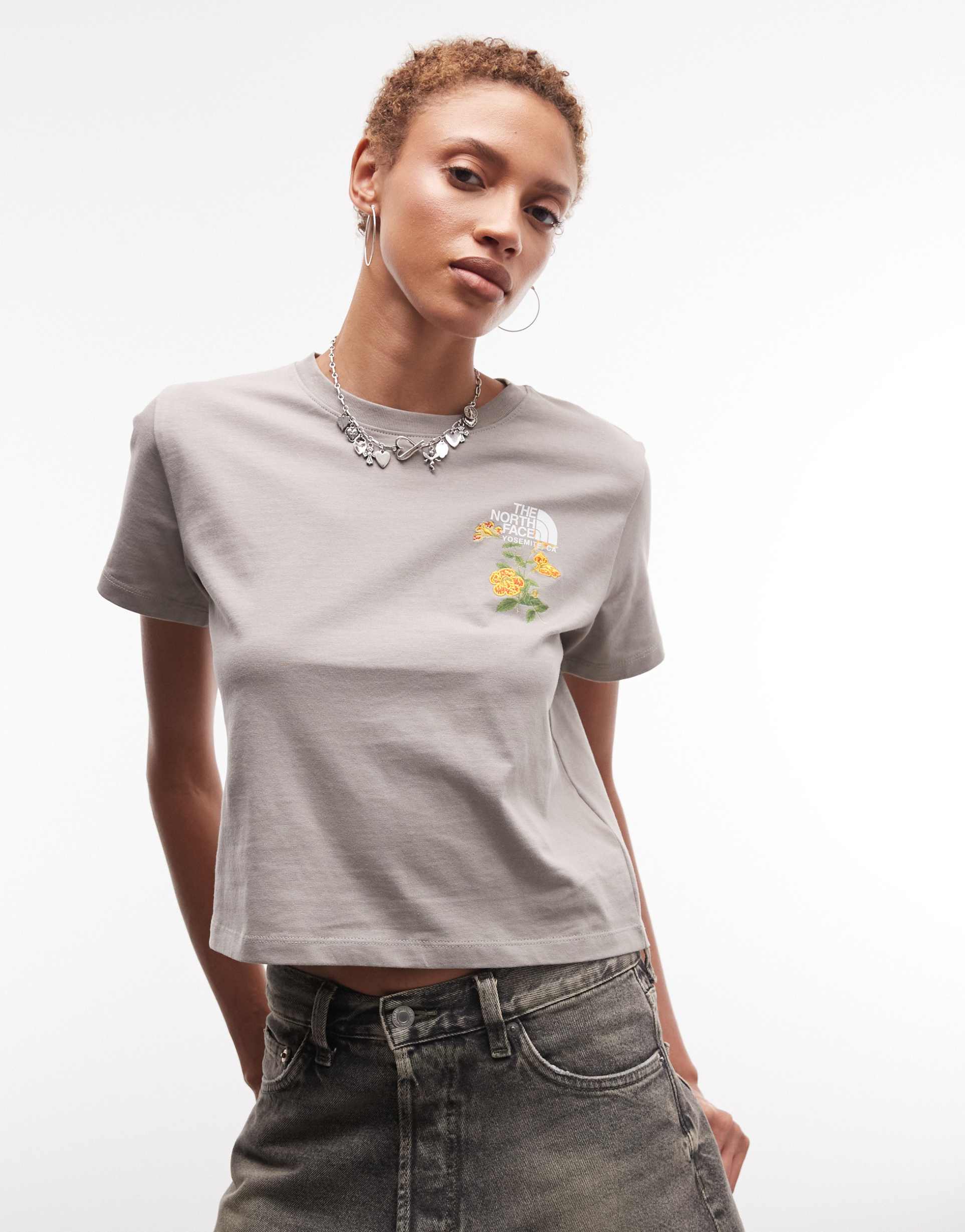 the north face flower embroidery t-shirt in gray