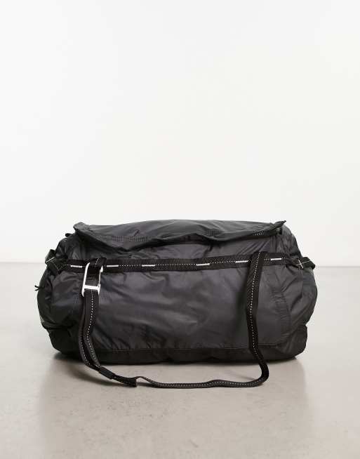 The North Face Flyweight duffel bag in black | ASOS
